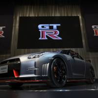 A Nissan GT-R Nismo sits on display as the automobile is unveiled at a world premiere event ahead of the 43rd Tokyo Motor Show in Yokohama, Nov. 19, 2013. The automobile has become the most expensive 2015-model vehicle to insure in the U.S. | BLOOMBERG