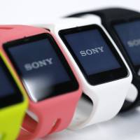 Sony Corp. SmartWatch 3 wearable devices sit on display during the Wearable Expo in Tokyo on Jan. 14. | BLOOMBERG