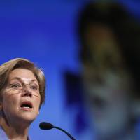 Sen. Elizabeth Warren speaks at the Credit Union National Association Governmental Affairs Conference in Washington on March 11. | REUTERS