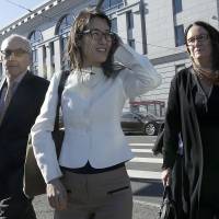 Ellen Pao (center) walks with attorneys Alan Exelrod (left) and Therese Lawless outside Civic Center Courthouse in San Francisco on Friday. A jury decided Friday that a prestigious venture capital firm did not discriminate or retaliate against Pao in a case that shined a light on gender imbalance and working conditions for women in Silicon Valley. | AP