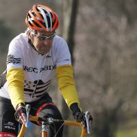 U.S Secretary of State John Kerry bicycles along the shore of Lake Geneva after holding meetings with Iranian Foreign Minister Javad Zarif over Iran’s nuclear program in Lausanne, Switzerland, on March 18. Iran faces a monthend deadline to reach a nuclear deal with the West to have sanctions against it eased, but has rejected a U.N. proposal to allow spot inspections of its nuclear sites. Iran rules out snap inspections of nuclear sites