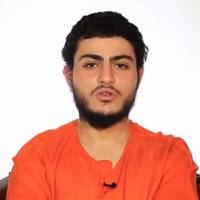 An image grab taken Tuesday from a video reportedly released by the Islamic State group through Al-Furqan Media, one of the Jihadist platforms used by the militant organization on the Web, shows a youth identifying himself as 19-year-old Mohammed Said Ismail Musallam, from Jerusalem, wearing an orange jumpsuit as he addresses the camera in Arabic at an undisclosed location. Islamic State released the video purportedly showing Musallam being executed by a young boy after he allegedly infiltrated the group in Syria to spy for the Jewish state. | AL-FURQAN MEDIA / HO / AFP-JIJI
