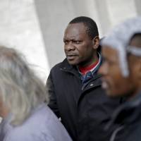 Homeless people wait to enter the Vatican on Thursday, when pope Francis made a surprise personal visit to 150 homeless people on a special tour of the Sistine Chapel during a private viewing of its ceiling frescoes painted by Michelangelo more than 500 years ago. | REUTERS