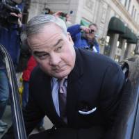 Former Connecticut Gov. John Rowland leaves federal court in New Haven on Wednesday. Rowland was sentenced to 30 months in prison for his role in a political consulting scheme on Wednesday, exactly one decade after he was ordered behind bars in an earlier scandal that forced him from office. | AP