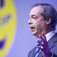 U.K. Independence Party leader Nigel Farage speaks to delegates during his political party\'s February 2014 spring conference in Margate, England. | BLOOMBERG