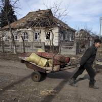 A ruined house in town of Debaltseve on Wednesday, which was besieged by pro-Russian rebels until Ukrainian government troops pulled out. The U.S. State Department called the rebels\' actions, during a supposed cease-fire, a \"land grab.\" | REUTERS