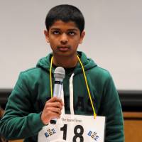 Ganesh Gautham Elango, 13, from K. International School Tokyo, pauses to think for a moment before spelling a word during the 6th Japan Times Bee in Tokyo on Saturday. | SATOKO KAWASAKI
