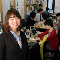 Kumi Imamura, head of NPO Katariba, poses in her office in Suginami Ward, Tokyo, on Feb. 19. | SATOKO KAWASAKI