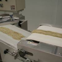 Sun Noodle makes 40,000 servings of fresh ramen a day at its Teterboro, New Jersey, factory. | AYAKO MIE