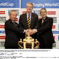 Venues revealed: (from left) Akira Shimazu, CEO of the Rugby World Cup 2019 Organizing Committee, Rugby World Cup chairman Bernard Lapasset and Japan Rugby Union chairman Tatsuzo Yabe attend a news conference on Monday in Dublin, where Japan\'s 12 host cities were announced. | KYODO/AP