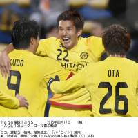 Joyful finish: Kashiwa Reysol\'s Naoki Wako celebrates with teammates Masato Kudo and Tetsuro Ota after his stoppage-time goal gave his club a 2-1 victory over Shandong Luneng in their Asian Champions League match on Tuesday in Kashiwa, Chiba Prefecture. | KYODO