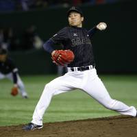 Rough outing: Japan starter Takahiro Matsuba yielded five runs and took the loss in Wednesday\'s game against Team Europe. | AP