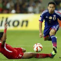 Rest and recuperation: Injured Inter Milan defender Yuto Nagatomo will stay in Italy rather than joining up with his Japan colleagues this week. | REUTERS
