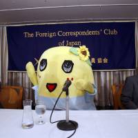 Funassyi, the popular unofficial mascot of Funabashi, Chiba Prefecture, greets reporters at the Foreign Correspondents\' Club of Japan in Tokyo on Thursday. Known for its bizarre squeaks and jumps, the mascot said it would be making more appearances overseas. | SATOKO KAWASAKI