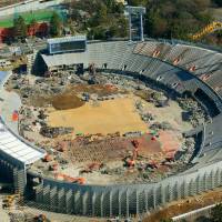 The media on Thursday were shown the progress that has been made in demolishing National Stadium in Tokyo\'s Shinjuku Ward. The centerpiece of the 1964 Olympic Games will have disappeared by September, and construction of a new 80,000-seat stadium for the 2020 Olympics is to begin in October. | KYODO