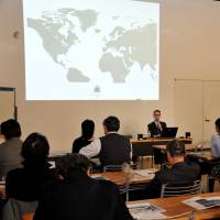Halldor Elis Olafsson speaks about Icelandic geothermal energy usage at a seminar in Tokyo on March 27. | YOSHIAKI MIURA