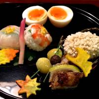 The hassun (mixed seasonal specialties) plate features Hyotei’s signature hanjuku (soft-boiled) egg. Hyotei