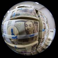 Bundles of ¥10,000 notes are arranged for a photo taken with a fish-eye lens at the Korea Exchange Bank headquarters in Seoul. | BLOOMBERG