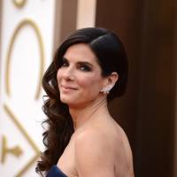 Sandra Bullock arrives March 2, 2014, at the Oscars at the Dolby Theatre in Los Angeles. People magazine has named Bullock as the \"World\'s Most Beautiful Woman\" for 2015, the magazine announced Wednesday. | AP