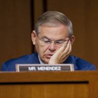 Sen. Robert Menendez listens to testimony during a Senate Finance Committee hearing on Oct. 10, 2013. Indicted Sen. Menendez's fate could sharpen Republicans' edge in U.S. Senate