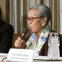 Former sex slave Kim Bok-dong (right) addresses the Foreign Correspondents\' Club of Japan on Friday. | KAZUAKI NAGATA