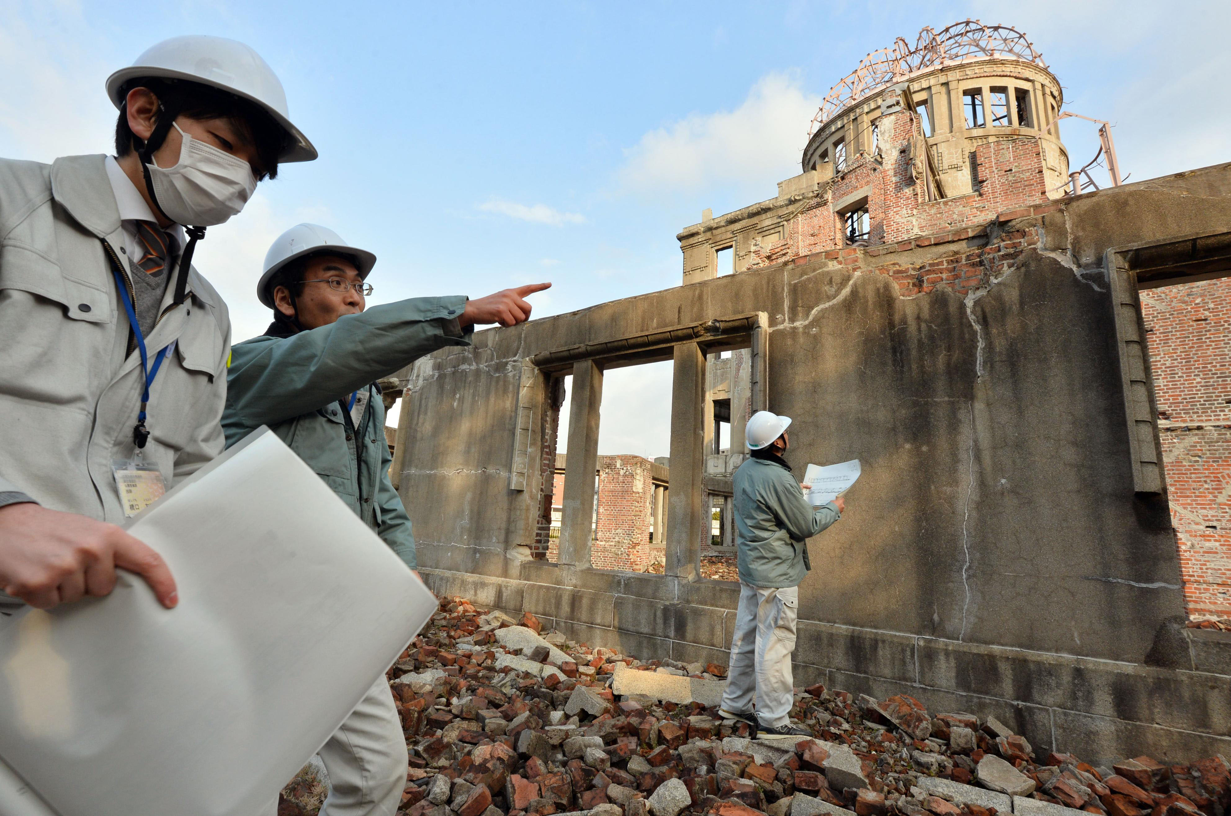 The Hiroshima A-Bomb Dome is surveyed in March last year. Experts from the U.S. and Japan are exploring ways to disclose key online hibakusha archival collections. | KYODO