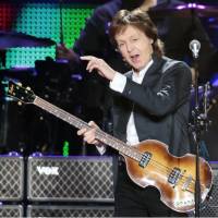 Paul McCartney performs at the Kyocera Dome Osaka stadium Tuesday in front of about 40,000 fans. | KYODO