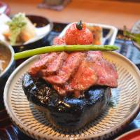 Don\'t touch: Wagyu beef, sizzling on top of a heated rock, is the main feature of Grand Kitchen Tada\'s considered maru gozen course meal. | J.J. O\'DONOGHUE