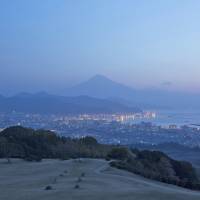Faint outlines: A view of Mount Fuji can be enjoyed from the Nippondaira Hotel. Jimbocho Den brings hot sake and hanami to Shizuoka
