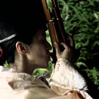 Sound travels: A still from the documentary film \"KanZeOn,\" directed by Neil Cantwell and Tim Grabham, shows Eri Fujii playing a Japanese reed instrument called the sh&#333; . | JAMES HADFIELD