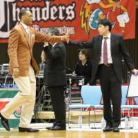 Working together: Former Toshiba teammates Brian Rowsom (left) and Takuya Kita serve on the Brave Thunders coaching staff. Rowsom is Kita\'s assistant. | KAZ NAGATSUKA
