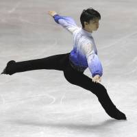 Center of attention: Yuzuru Hanyu performs during the men\'s short program at the World Team Trophy on Thursday at Yoyogi National Gymnasium. Hanyu won the short program with 96.27 points. | AP