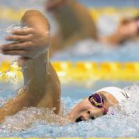 Solid achievement: Rikako Ikee earns a third-place finish in the women\'s 200-meter freestyle on Thursday at the National Swimming Championships at Tatsumi International Swimming Center. | KYODO
