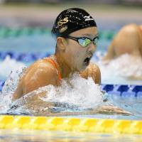 Another record: Kanako Watanabe shatters her own national record in the women\'s 200-meter individual medley at the national championships on Friday at Tatsumi International Swimming Center. | KYODO