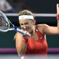 Methodical: Victoria Azarenka of Belarus hits a return against Japan\'s Misaki Doi during their singles match at the Fed Cup World Group II playoff on Saturday at Ariake Colosseum. | AFP-JIJI