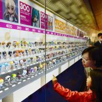 Some 500 palm-size character dolls are displayed Thursday, the first day of a doll exhibition at Kurayoshi Museum in Kurayoshi, Tottori Prefecture. The exhibition will run through May 10. | KYODO