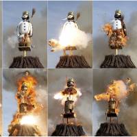 The Boeoegg snowman, a symbol of winter made of wadding and filled with firecrackers, burns atop a bonfire at the climax of Zurich\'s annual spring festivities in Sechselaeuten Square on Monday. The faster its head catches fire and explodes, the warmer and more beautiful the summer will be. | REUTERS