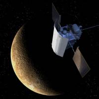 In this illustration, NASA\'s Messenger spacecraft is seen orbiting Mercury. The sunshade shields the spacecraft\'s instruments from heat and solar radiation. | AP
