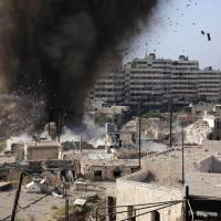 Explosives are detonated by Syrian government forces inside a tunnel that was reportedly used by rebels in the government-controlled section of Aleppo on Tuesday. | AFP-JIJI