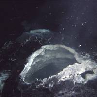 A \"snowblower\" hydrothermal vent spews hot water and white bits of bacterial mat at the \"Axial Seamount\" off the coast of Oregon. | REUTERS