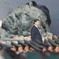 Chinese President Xi Jinping (center) and other leaders attend a memorial ceremony at the Nanking Massacre Museum in Nanjing, China, on Dec. 13. | REUTERS