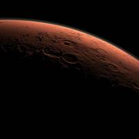 This computer-generated view shows an area including Gale Crater, which NASA\'s Curiosity rover is exploring, beginning to catch the morning light on Mars. | NASA / JPL-CALTECH / REUTERS