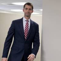 Sen. Tom Cotton, R-Ark. walks in Capitol Hill in March. The Senate muscled its way into President Barack Obama\'s talks to curb Iran\'s nuclear program, overwhelmingly backing legislation Thursday that would let Congress review and possibly reject any final deal with Tehran. The vote was 98-1 for the bipartisan bill that would give Congress a say on what could be a historic accord that the United States and five other nations are trying to finalize with Iran, which would get relief from crippling economy penalties. The lone no vote came from Cotton, who wants the administration to submit any agreement to the Senate as a treaty. | AP