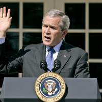 In this April 3, 2007, file photo, then-President George W. Bush speaks about the congressional debate on Iraq war spending, in the Rose Garden of the White House. A dozen years later, American politics has finally reached a rough consensus about the Iraq War: It was a mistake. Liberals have been saying that for years, of course, and polls show most of the public already had judged the war a failure. Even many Republican politicians have allowed that the failure to find weapons of mass destruction in Iraq undermined the rationale for the 2003 invasion. White House hopefuls from both parties distance themselves from 2003 Iraq war decision