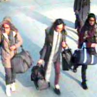 In this still taken from CCTV and issued by London’s the Metropolitan Police, 15-year-old Amira Abase (left), Kadiza Sultana, 16 (center) and Shamima Begum, 15, are seen at Gatwick Airport, south of London, before they flew to Turkey on Feb. 17. Western girls flee to IS areas in search of sisterhood, not just marriage: study