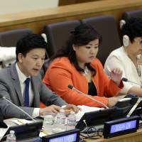 North Korean defectors (from left) Joseph Kim, Jay Jo, and Kim Hye Sook participate in a panel on North Korean human rights abuses at United Nations headquarters Thursday. | AP
