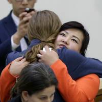 United States Ambassador to the United Nations Samantha Power hugs North Korean defector Kim Jay Jo after a panel discussion on North Korean human rights abuses at United Nations headquarters Thursday. | AP