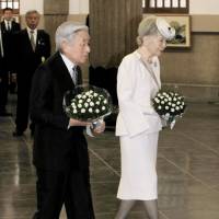 Emperor Akihito and Empress Michiko attend a memorial service for victims of the massive March 10, 1945, air raid on Tokyo at the Tokyo Memorial Hall in Sumida Ward. | KYODO