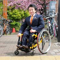 Toshiya Kakiuchi, president of Mirairo Inc., poses outside the consultancy\'s Tokyo office on April 15. | SATOKO KAWASAKI