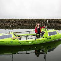 Sonya Baumstein stands in her 23-foot (7.01 meter) carbon and kevlar solo rowboat in this handout picture courtesy of Andrew Cull in Port Townsend, Washington, on April 12. Baumstein will attempt a 6,000-mile (9,600 km) crossing of the Pacific Ocean &#8212; a feat no woman has ever accomplished solo, departing this month from Chiba Prefecture. | ANDREW CULL/HANDOUT VIA REUTERS
